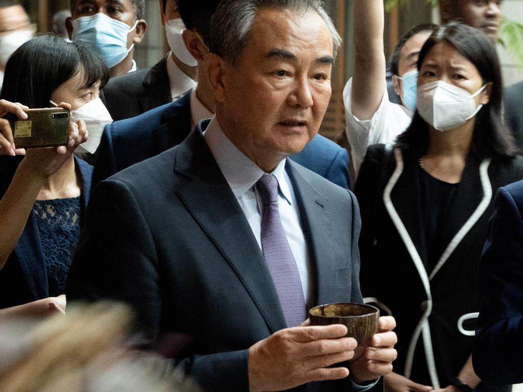 Visiting Chinese Foreign Minister Wang Yi drinks kava, a traditional ceremonial drink, during his visit to Vanuatu's capital city Port Vila on Wednesday. Picture: Ginny Stein / AFP