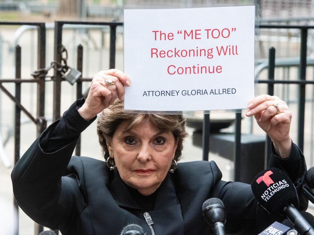 Gloria Allred, lawyer for several of Harvey Weinstein’s victims, holds up a “Me Too” sign outside New York City’s Criminal Court. This comes after the New York State Court of Appeals recently overturned Weinstein’s 2020 rape conviction. Picture: Stephanie Keith/Getty Images