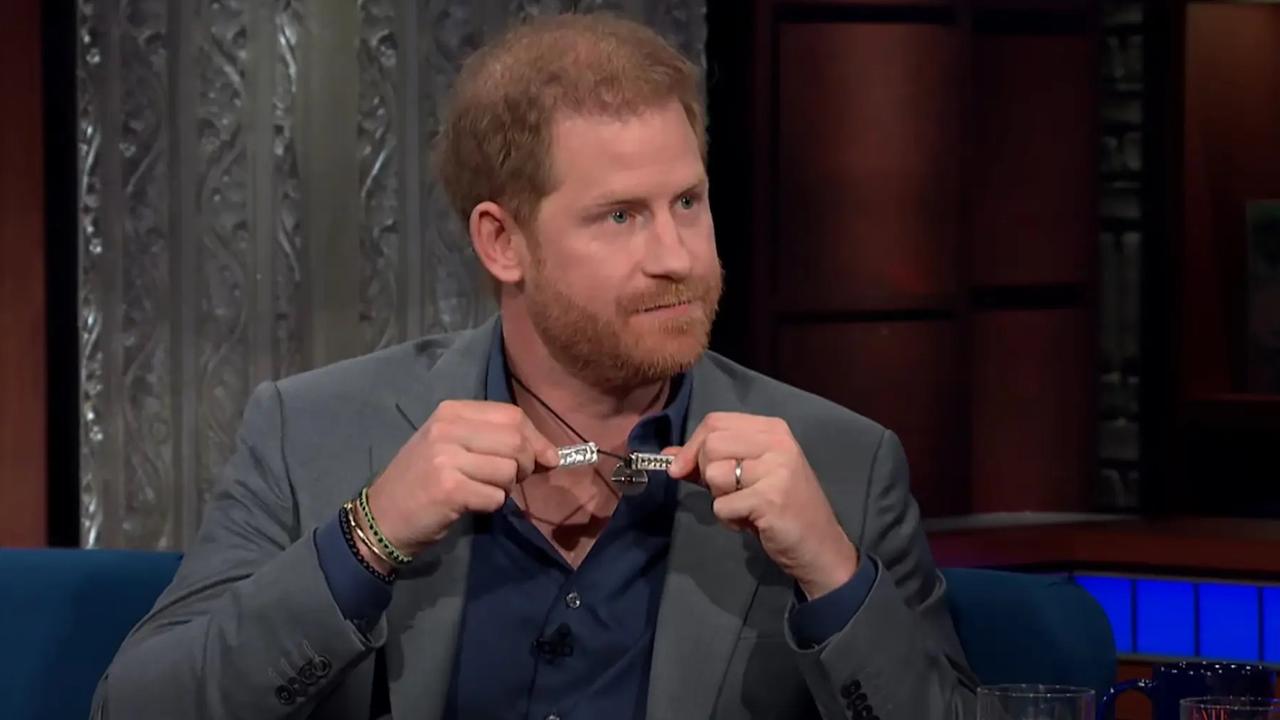 Prince Harry shows his broken necklace on The Late Show With Stephen Colbert. Picture: CBS