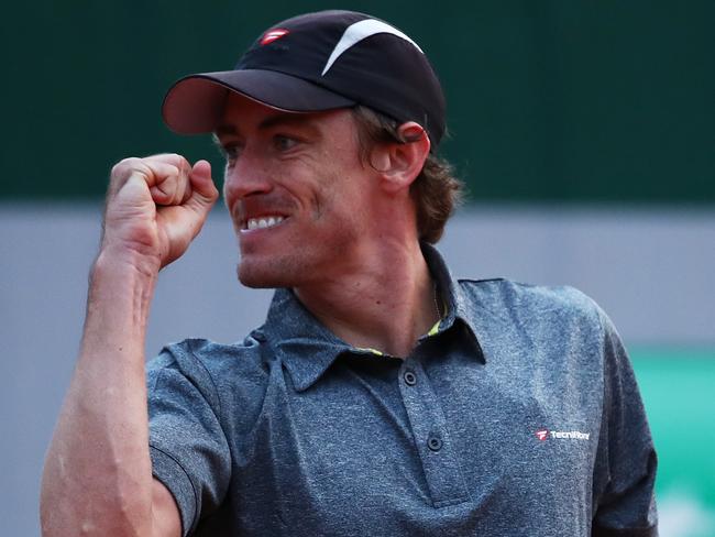 PARIS, FRANCE - MAY 23: John Millman of Australia reacts during the Men's Singles first round match against John Isner of the United States on day two of the 2016 French Open at Roland Garros on May 23, 2016 in Paris, France. (Photo by Clive Brunskill/Getty Images)