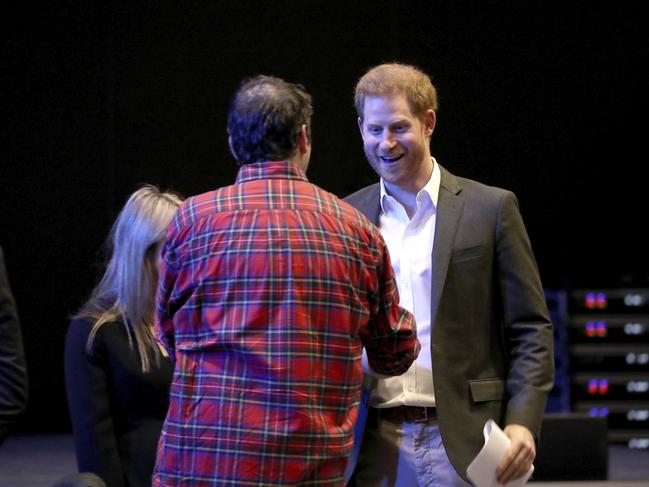 The Duke of Sussex was all smiles at the charity event. Picture: AP