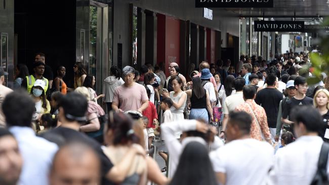 Shoppers crowd Melbourne’s Bourke Street Mall for the Boxing Day sales. Picture: Andrew Henshaw