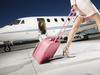 Businesswoman Alighting From Private Jet