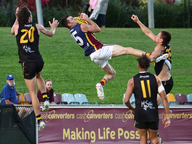 Tyron Rainbird takes a huge mark in the AFL Cairns premiership men's preliminary final match between the Cairns City Lions and the North Cairns Tigers, held at Cazalys Stadium, Westcourt. Picture: Brendan Radke