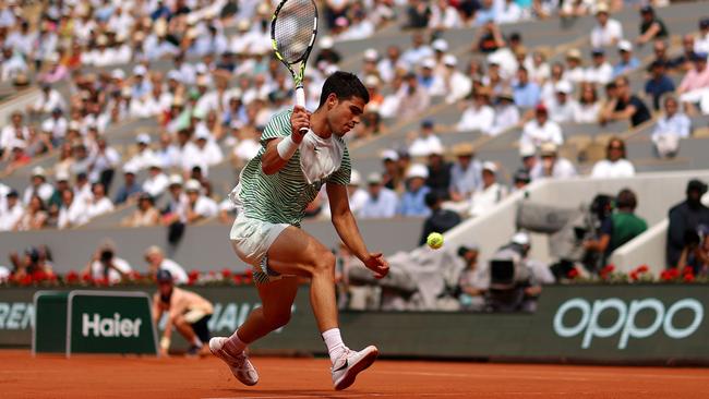 Carlos Alcaraz played the shot of the year in the French Open semi-final against Novak Djokovic. Picture: Clive Brunskill/Getty Images