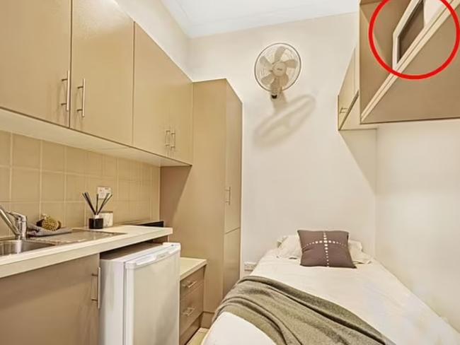 The unique placement of the microwave in this studio apartment has caused quite a stir. Picture: Domain