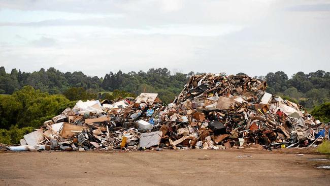 Queenslanders produced enough waste to fill almost 9000 Olympic-sized swimming pools in the 2017-18 financial year. Picture: Marc Stapelberg