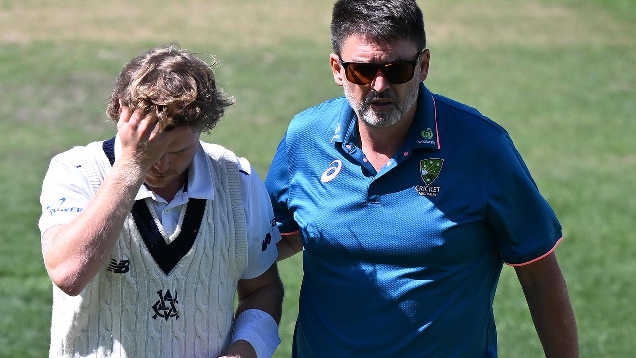 Will Pucovski of the Bushrangers leaves the field after being struck during the Sheffield Shield match between Tasmania and Victoria on March 03, 2024. (Photo by Steve Bell/Getty Images)