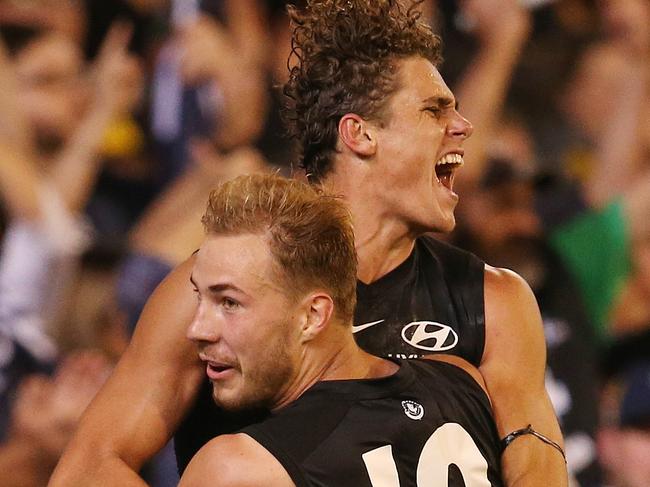 AFL Round1. Carlton vs Richmond at the MCG.   Charlie Curnow of the Blues celebrates a 3rd qtr goal with Harry McKay   . Pic: Michael Klein