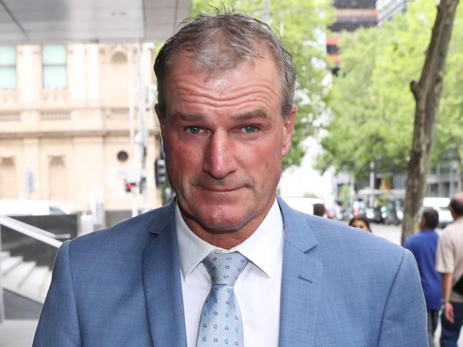 Darren Weir leaves the County Court of Victoria in Melbourne, Friday, February 14, 2020. Disqualified horse trainers Jarrod McLean, Darren Weir, and stablehands William Hernan and Tyson Kermond face charges of animal cruelty and conspiracy offences. (AAP Image/David Crosling) NO ARCHIVING