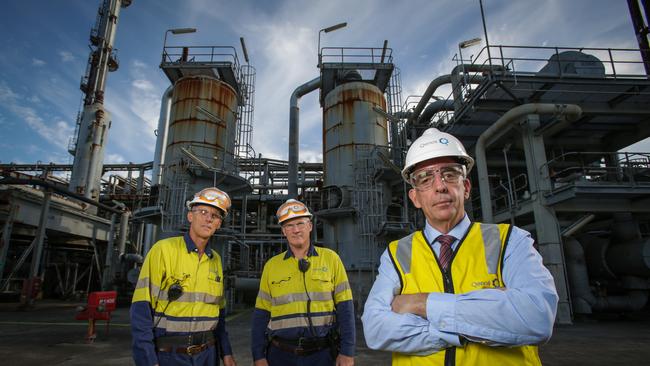 Qenos process operators with Qenos CEO Steve Bell (right) at the Qenos petrochemical plant in Matraville, Sydney.