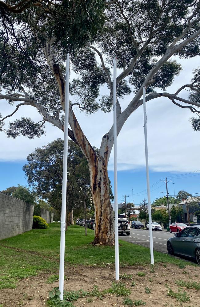 The flagpoles that were erected outside Yarra council's Clifton Hill depot.