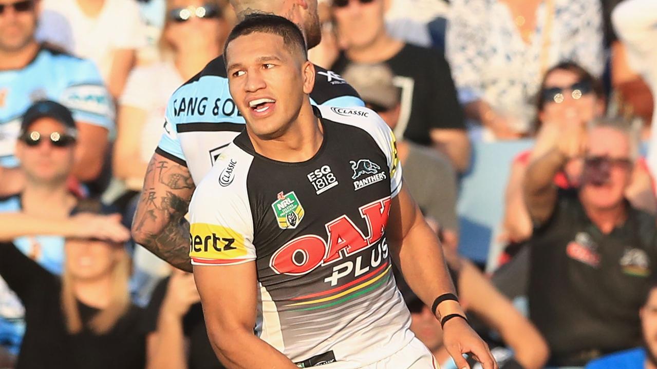 Dallin Watene-Zelezniak of the Panthers celebrates a try.