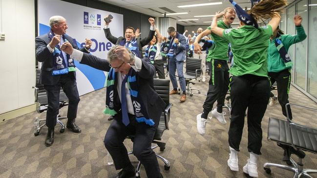 Football Federation Australia chairman Chris Nikou cheers alongside officials and players as FIFA announce Australia as the host of the 2023 Women's World Cup. Picture: Getty Images