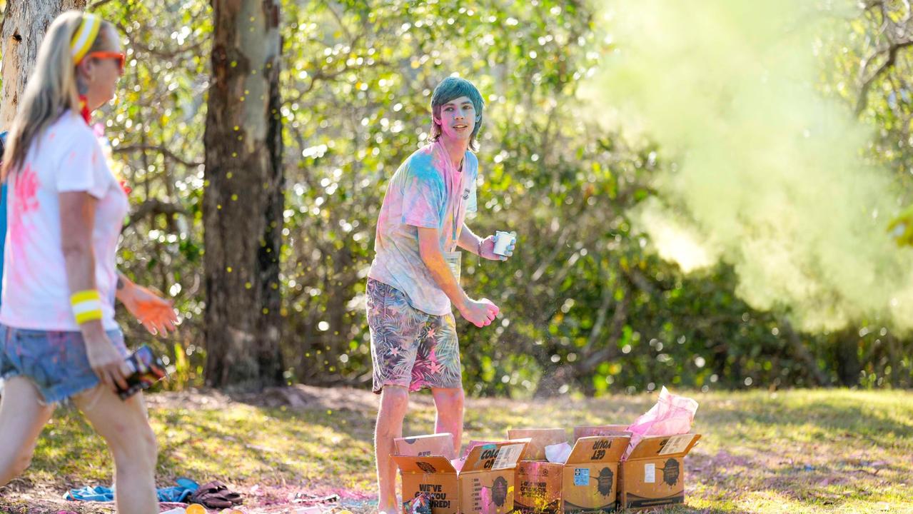 Photos from Cherryandjun Photography of the 2023 Gladstone Colour Me Capricorn fun run for the RACQ CapRescue.