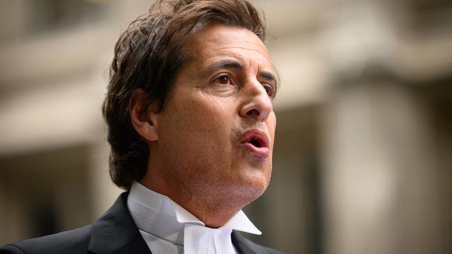 Harry’s barrister David Sherbourne reads a written statement outside the court in London on Friday. Picture: Getty Images