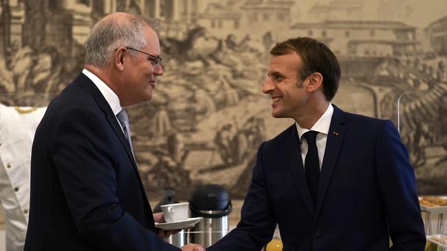 Australian Prime Minister Scott Morrison and French President Emmanuel Macron talk in Rome at the G20 leaders meeting. Picture: Adam Taylor