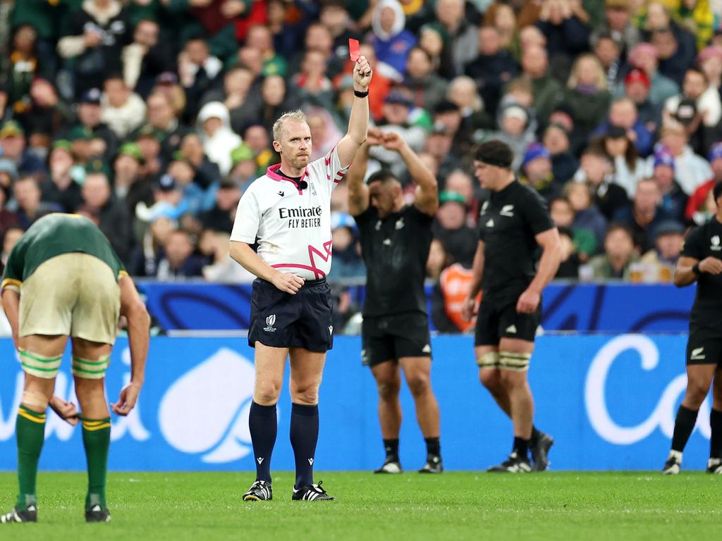 Referee Wayne Barnes upgrades Sam Cane of New Zealand's yellow card to a red card. Picture: Cameron Spencer/Getty Images