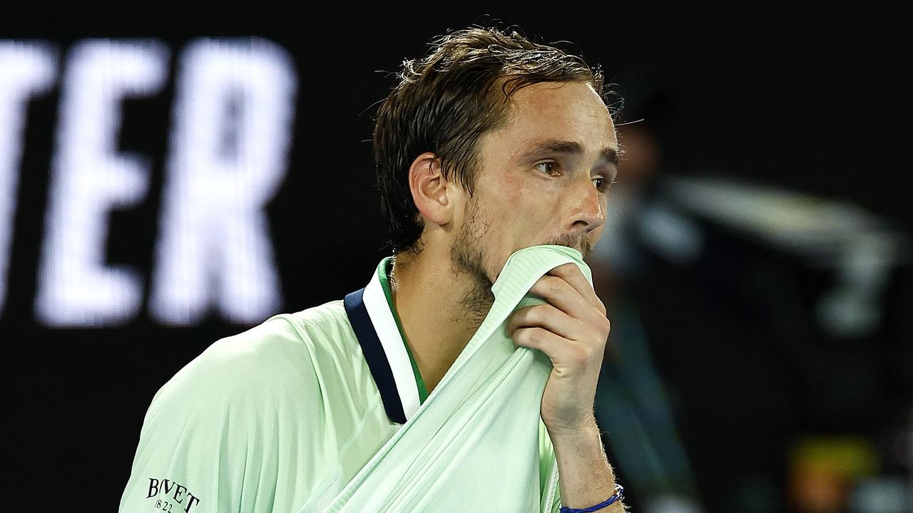 MELBOURNE, AUSTRALIA - JANUARY 30: Daniil Medvedev of Russia reacts in his Men's Singles Final match against Rafael Nadal of Spain during day 14 of the 2022 Australian Open at Melbourne Park on January 30, 2022 in Melbourne, Australia. (Photo by Daniel Pockett/Getty Images)