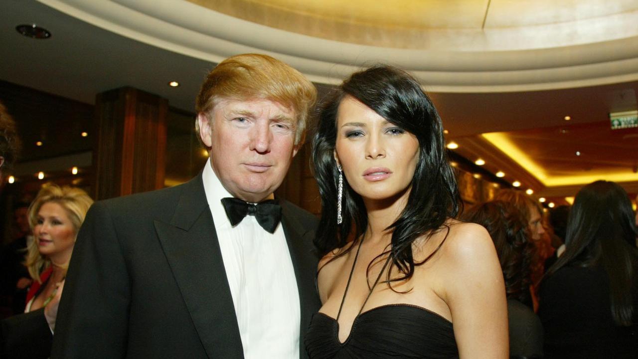 Slovenian-born model Melania Trump (nee-Knauss) met DonaldTrump at a Fashion Week party in 1998, where she refused to give him her number. They began dating several months later. Here, they are pictured at a charity ball in 2004.