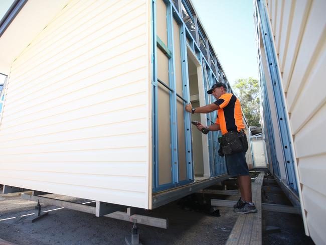 Oly Homes is a Sunshine Coast company building pre-fabricated homes for buyers across Queensland. Story is an innovation piece on how pre-fabrication can help reduce construction costs and increase housing affordability. We need 1. Shots of a home build in progress on the factory floor, and 2. Nice shots of one of their finished homes pic Jamie Hanson