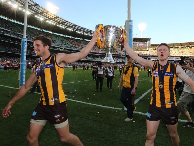 Ben Stratton and Liam Shiels celebrate after Hawthorn’s 2014 grand final win over Sydney. Picture: Alex Coppel.