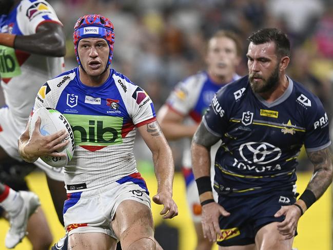 TOWNSVILLE, AUSTRALIA - MAY 07:  Kalyn Ponga of the Knights makes a break during the round nine NRL match between the North Queensland Cowboys and the Newcastle Knights at Qld Country Bank Stadium, on May 07, 2022, in Townsville, Australia. (Photo by Ian Hitchcock/Getty Images)