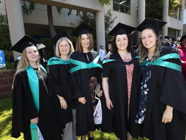 Theresa Scott, Michelle Middap, Rachel Storace,Jennifer Atkinson and Jodi van Adrichem at the UTAS Graduation at Burnie. PICTURE CHRIS KIDD