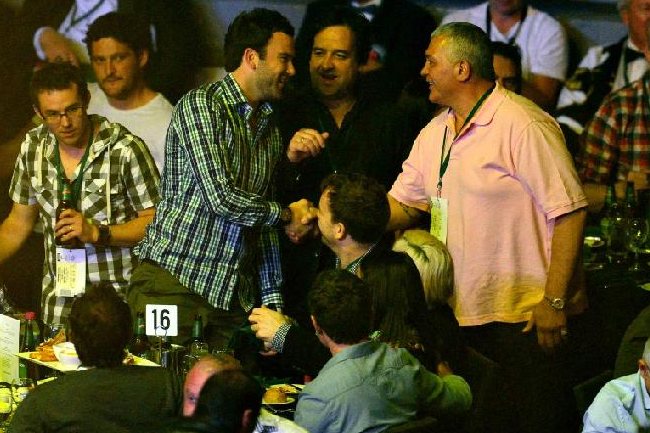 Mick Gatto pictured with funny man Mick Molloy, Hawthorn footballer Jordan Lewis and Brendan Fevola (in the background). Picture: Herald Sun