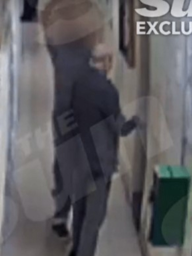 The video shows the attacker sneaking up on Cooke as he studies a noticeboard. Photo: The Sun