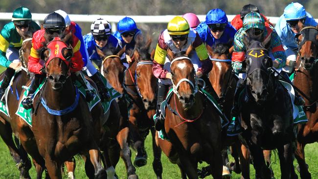 Loving home ridden by Tye Angland  (yellow cap, maroon with yellow armbands) wins race 1 during Scone  Races located in the Upper Hunter Region of NSW. The Bend . Pic Jenny Evans
