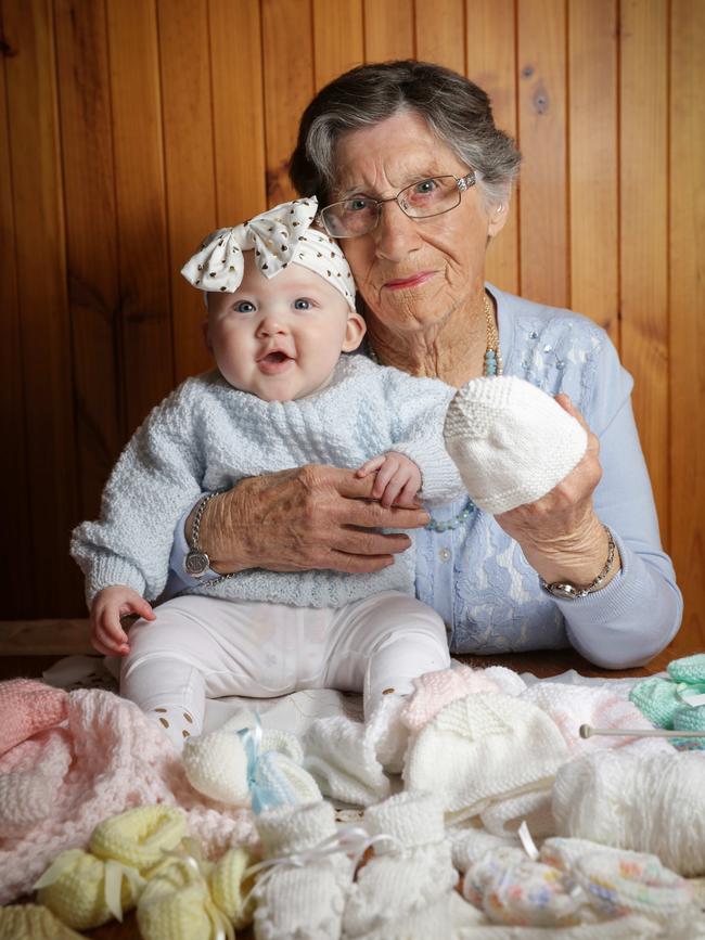 Nancy Winder knits beanies from prem babies like Sienna, 8 months. Picture: Nicole Cleary