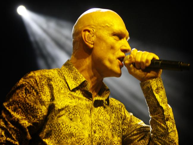 Peter Garrett, Federal Minister for the Environment, Heritage and the Arts, on stage as lead singer with his former band 'Midnight Oil' at the Royal Theatre in Canberra.