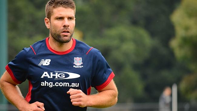 The Demons are ready to finally improve under Paul Roos. Mark Jamar goes for a run at training.