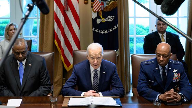 Joe Biden, flanked by Defence Secretary Lloyd Austin and Joint Chiefs of Staff chairman Charles Q. Brown Jr at the White House cabinet room on Wednesday, is running out of time to convince undecided voters that Donald Trump is worse than he is. Picture: AFP