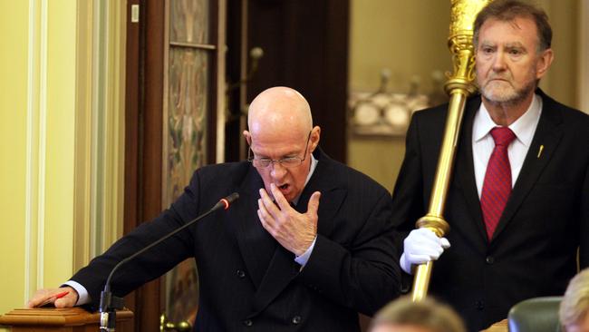 Disgraced former Labor government minister Gordon Nuttall, watched over by parliament’s Sergeant of Arms, defends himself on contempt of parliament charges, as the first prisoner to appear before the house, in 2011. Picture: Lyndon Mechielsen