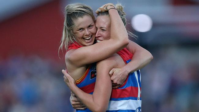 Katie Brennan celebrates a goal with teammate Lauren Spark. Picture: Wayne Ludbey