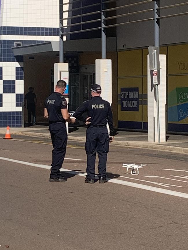 NT Police officers prepare to operate a drone at the Darwin CBD Watch House on Knuckey Street on September 11, 2024 after two prisoners allegedly escaped through a window. Photo: Sierra Haigh