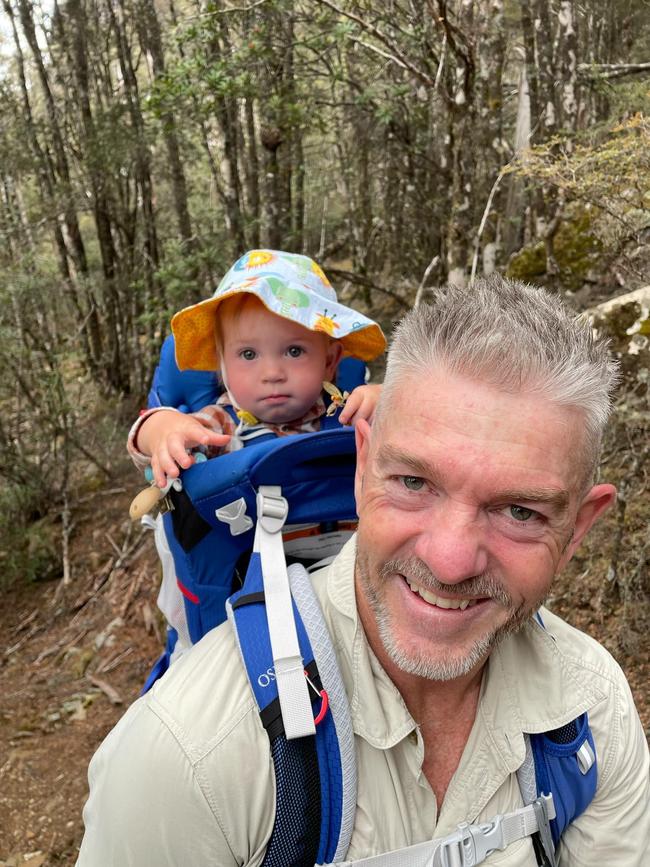 Warrick "Waz" Bidwell and his son Jack on a bushwalk in the Great Western Tiers a week before he was taken to hospital after an incident while riding at Maydena. Picture: Amie Bidwell.