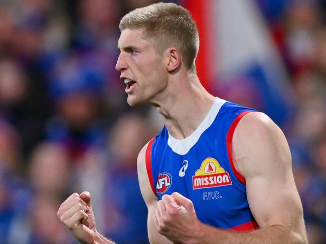 GEELONG, AUSTRALIA - AUGUST 26: Tim English of the Bulldogs celebrates a goal during the round 24 AFL match between Geelong Cats and Western Bulldogs at GMHBA Stadium, on August 26, 2023, in Geelong, Australia. (Photo by Morgan Hancock/Getty Images)