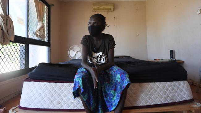 Coralie Moore sits on the end of her bed in the house she has abandoned because it was making her more unwell. Picture: (A)manda Parkinson