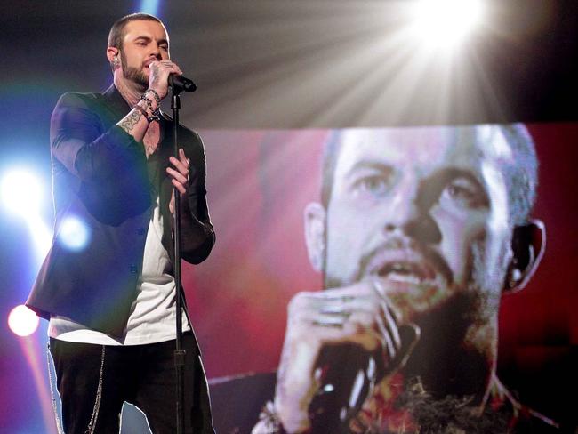 Contestant Mitchell Callaway performs on stage during the 2011 season of the Channel Seven (7) TV program 'X Factor Australia' at Fox Studios in Moore Park, Sydney.