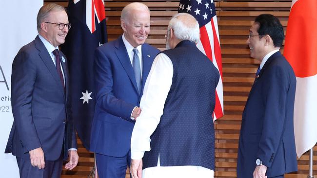 (L-R) Australian Prime Minister Anthony Albanese, US President Joe Biden, Indian Prime Minister Narendra Modi and Japanese Prime Minister Fumio Kishida greet before the QUAD leaders meeting in Tokyo on May 24, 2022. Picture AFP
