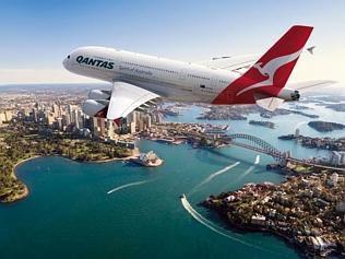 Supplied Editorial A Qantas A380 flies over Sydney Harbour