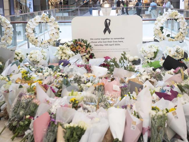 SYDNEY, AUSTRALIA.NewsWire Photos. April 20, 2024.Tributes flow as shoppers return to Westfield shopping centre in Bondi Junction a week after 40 year old Joel Cauchi stabbed and killed six people and wounded many others before being shot dead by police .  Picture: NCA NewsWire / Jeremy Piper