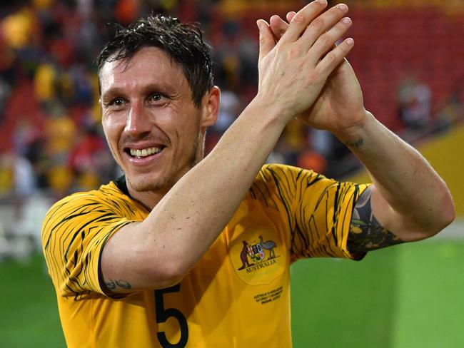 Mark Milligan of the Socceroos is seen reacting at the end of the International friendly match between Australia and the Korea Republic at Suncorp Stadium, in Brisbane, Saturday, November 17, 2018. (AAP Image/Darren England) NO ARCHIVING, EDITORIAL USE ONLY