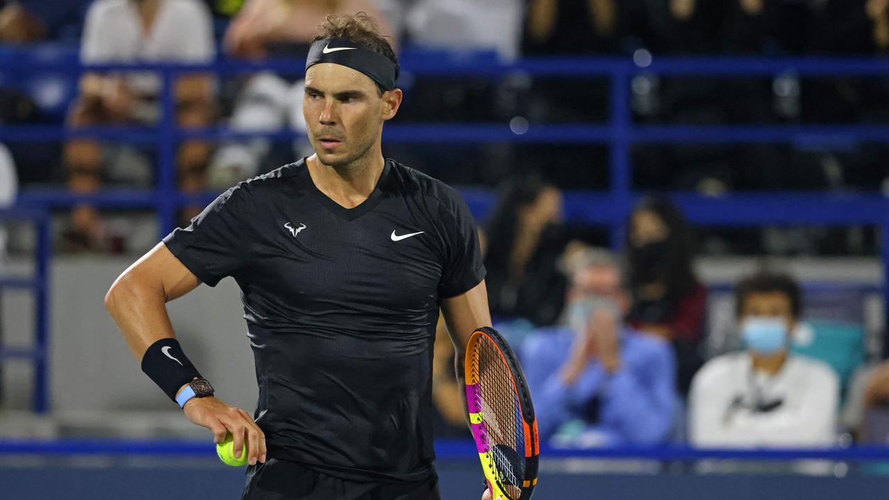 Spain's Rafael Nadal reacts during his semi-final match against Britain's Andy Murray in the Mubadala World Tennis Championship in the Gulf emirate of Abu Dhabi on December 17, 2021. (Photo by Giuseppe CACACE / AFP)