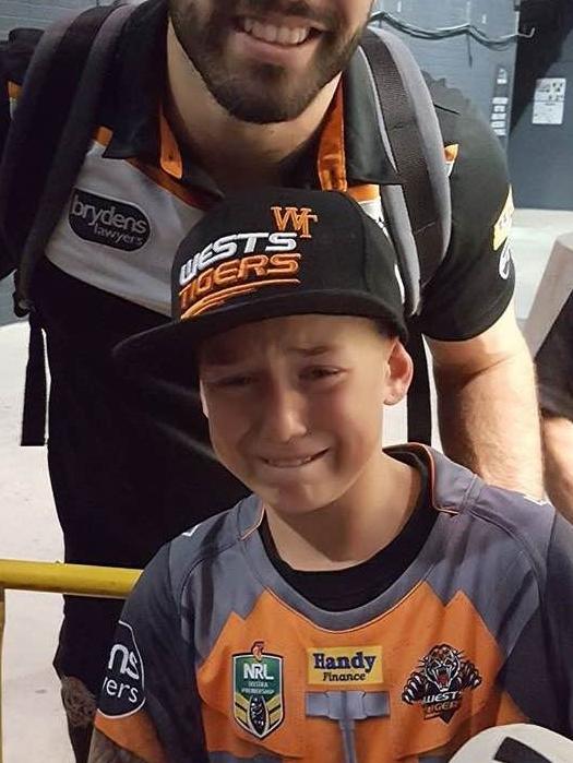 James Tedesco with young fan Ashton