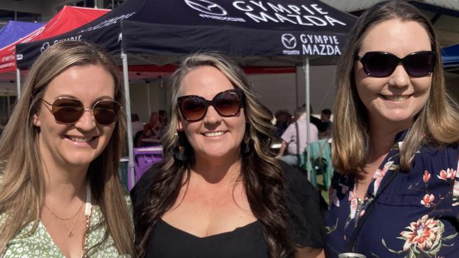 Merry Rigby, Tamara Tavasci, and Wendy Hutchison enjoy a day of fun at the Gympie Races on Saturday, July 15, 2023.