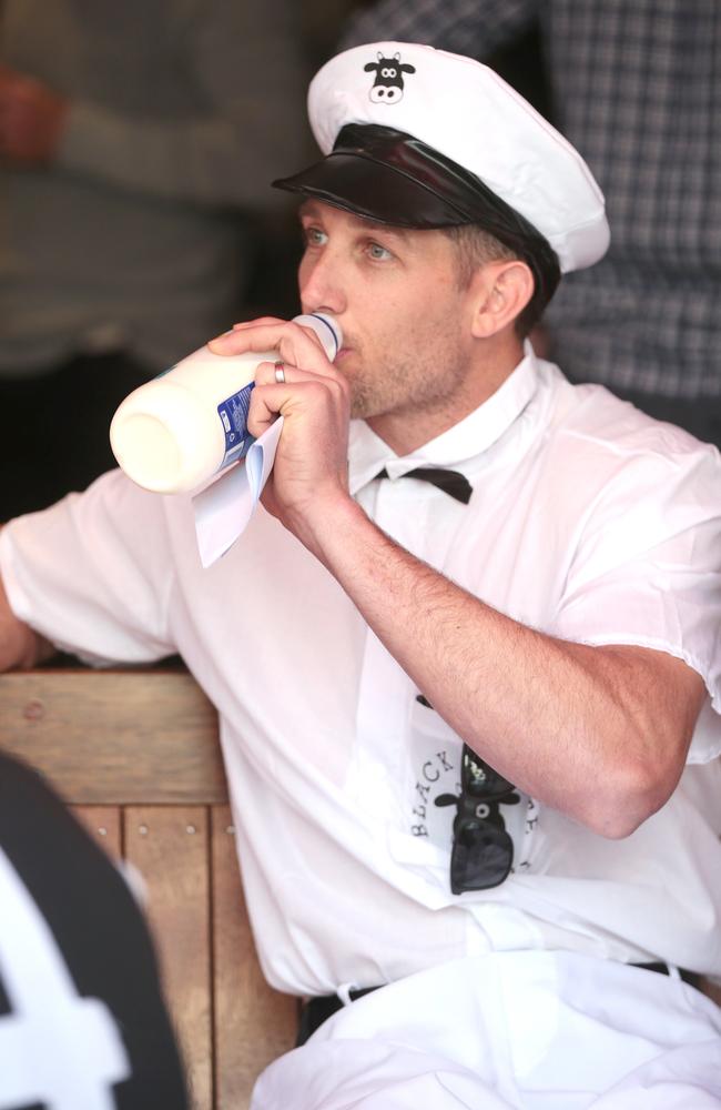 Harry Taylor drinks milk at Cats Whacky Wednesday. Picture: Alison Wynd